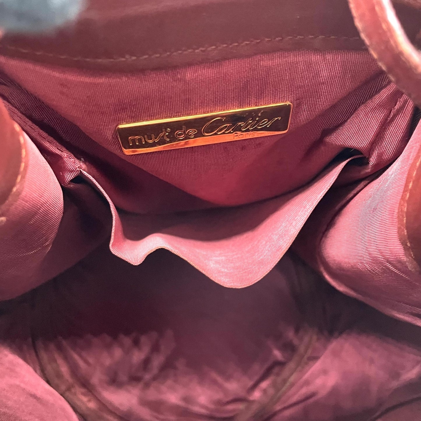 カルティエ マストライン ショルダーバッグ 巾着型 ボルドー ワインレッド レザー ゴールド金具 ロゴ型押し ヴィンテージ レディース A8