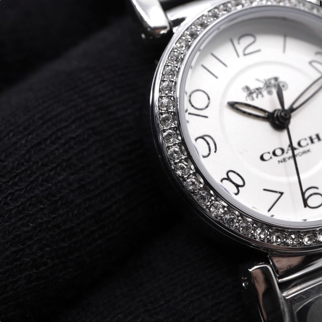 【ほぼ新品／電池交換済】コーチ COACH 腕時計 CA.66.7.95.1489S レディース クオーツ アナログ ラウンド シルバー ラインストーンベゼル シグネチャーブレスレット エレガント フェミニン ドレスウォッチ クリーニング済 G