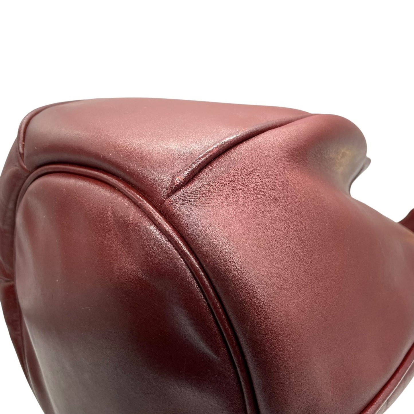 カルティエ マストライン ショルダーバッグ 巾着型 ボルドー ワインレッド レザー ゴールド金具 ロゴ型押し ヴィンテージ レディース A8