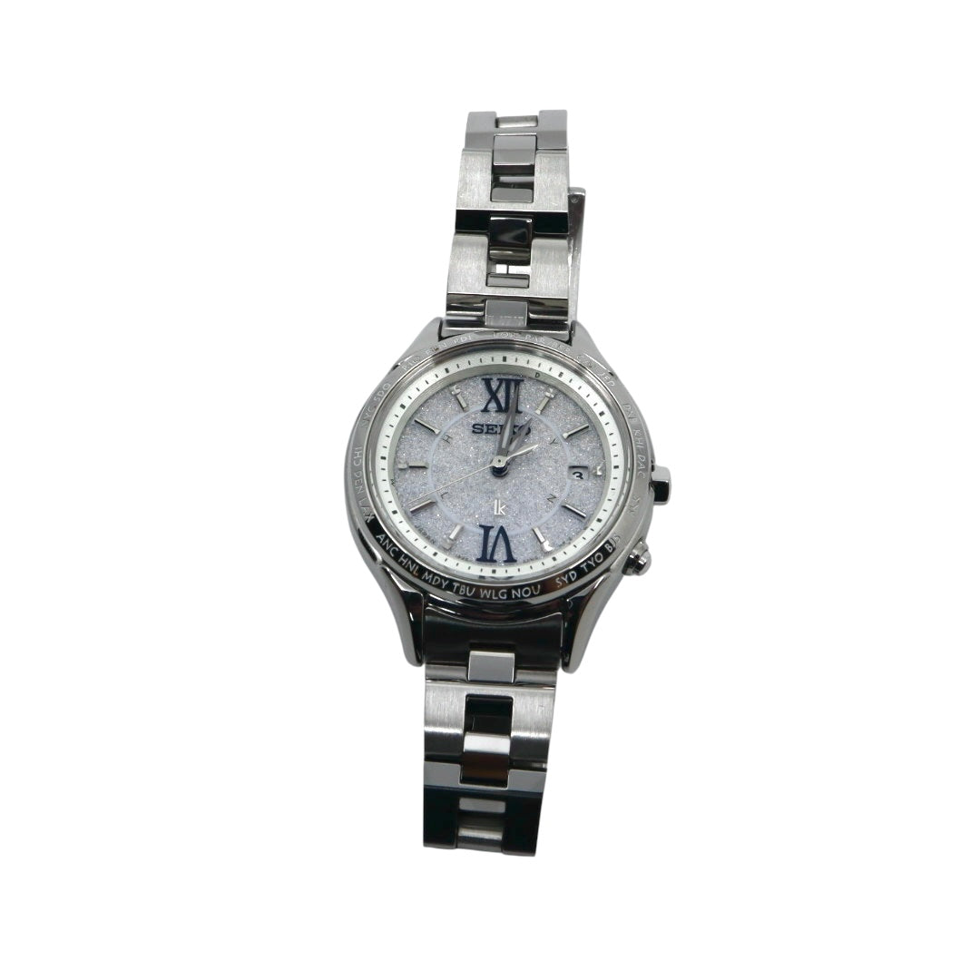 【未使用級/美品/稼働品】セイコー ルキア SEIKO LUKIA レディース腕時計 1B25-0AH0 ソーラー電波 ワールドタイム シルバー ラメ文字盤 グリッターダイヤル ステンレス 日本製 エレガント ビジネス クリーニング済 G2