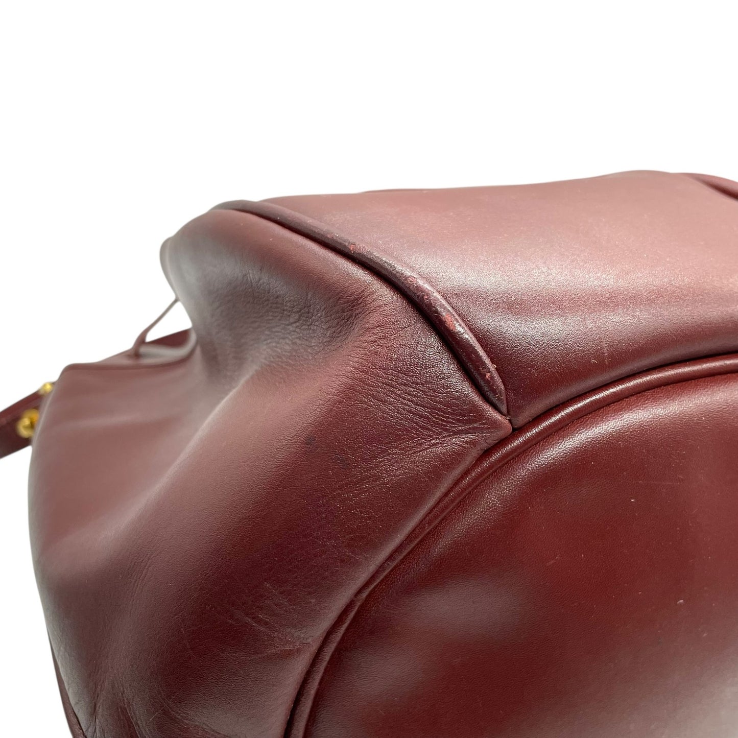 カルティエ マストライン ショルダーバッグ 巾着型 ボルドー ワインレッド レザー ゴールド金具 ロゴ型押し ヴィンテージ レディース A8
