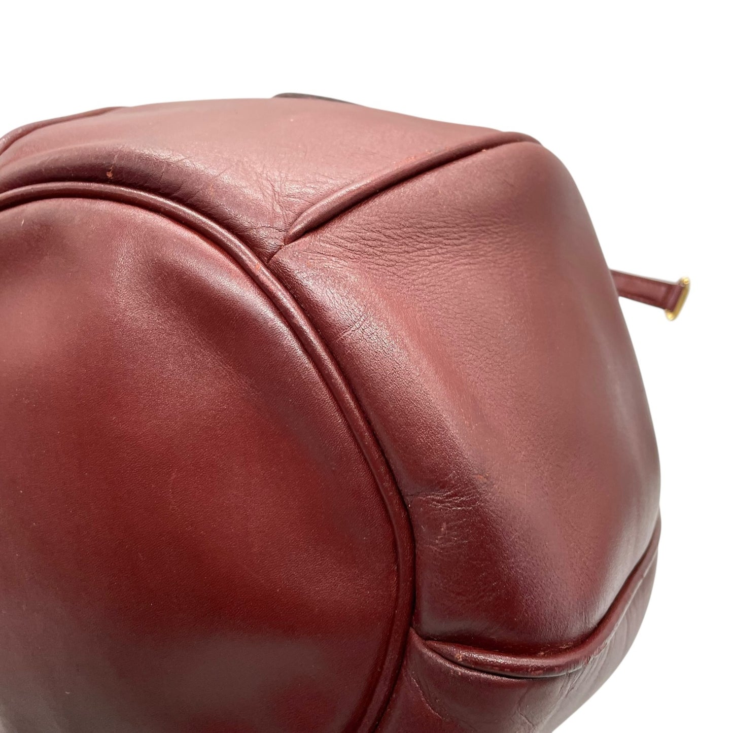 カルティエ マストライン ショルダーバッグ 巾着型 ボルドー ワインレッド レザー ゴールド金具 ロゴ型押し ヴィンテージ レディース A8