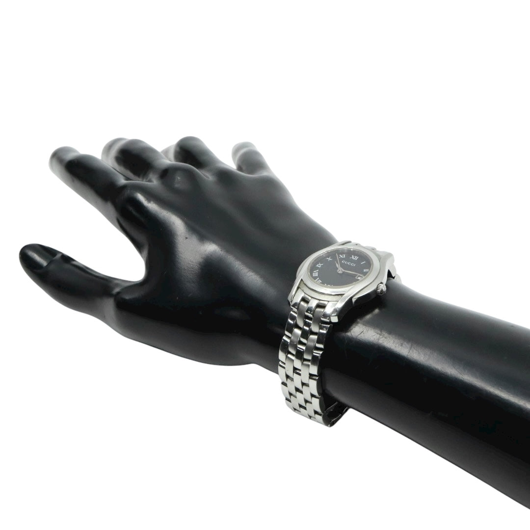 GUCCI グッチ 5500L レディース腕時計 ブラック文字盤 ローマンインデックス デイト ステンレススチール クォーツ スイス製 リンクブレス G11