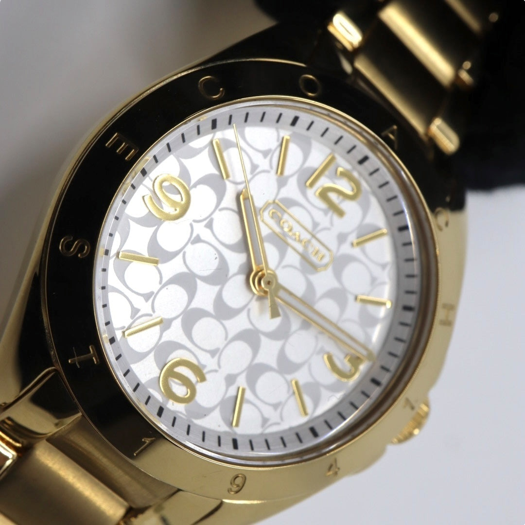 美品 電池交換済 クリーニング済 コーチ COACH 腕時計 CA-67.7.34.0690 レディースウォッチ クォーツ ゴールド ステンレススチール シルバー文字盤 シグネチャー柄 アナログ エレガント クラシック ドレスウォッチ 稼働品 G3