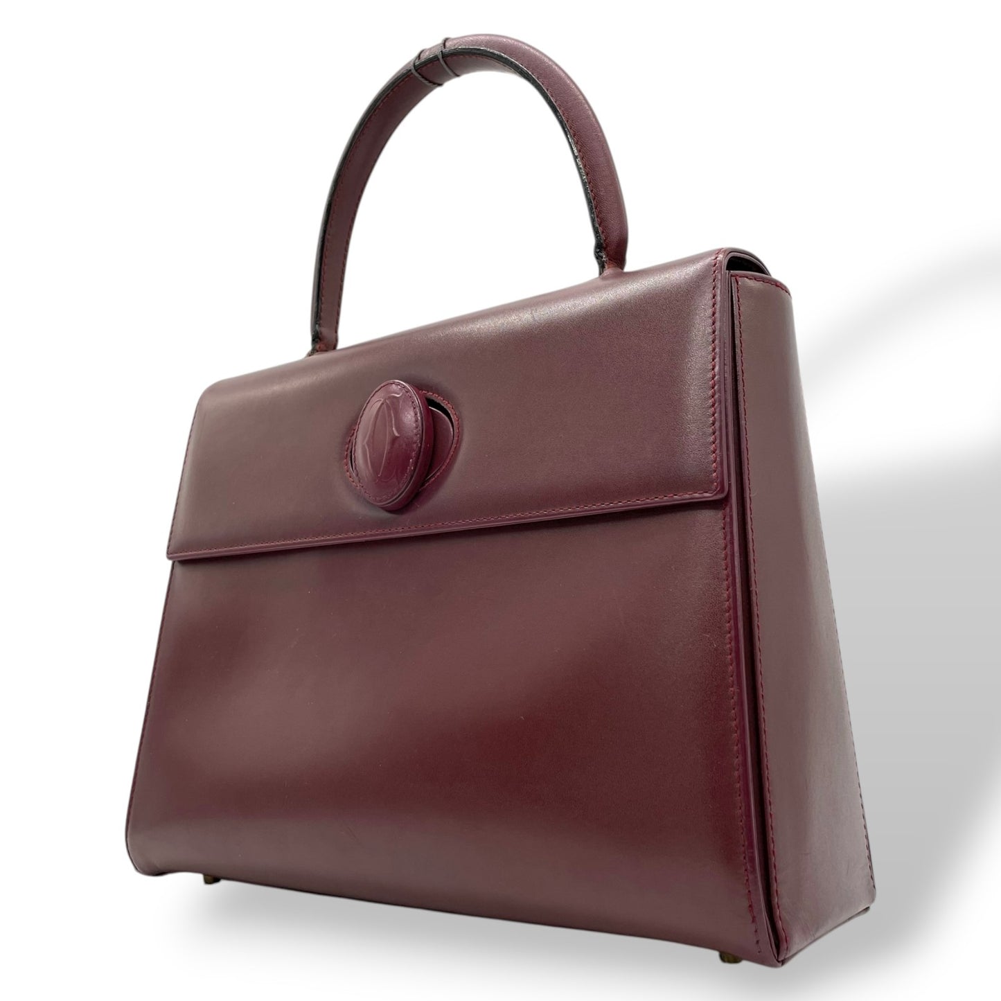 カルティエ マストライン ハンドバッグ ワンショルダー 自立可 ターンロック 2Cロゴ Cロゴ レザー 本革 ボルドー ワインレッド レディース ヴィンテージ クラシック エレガント フォーマル パーティバッグ 高級感 G