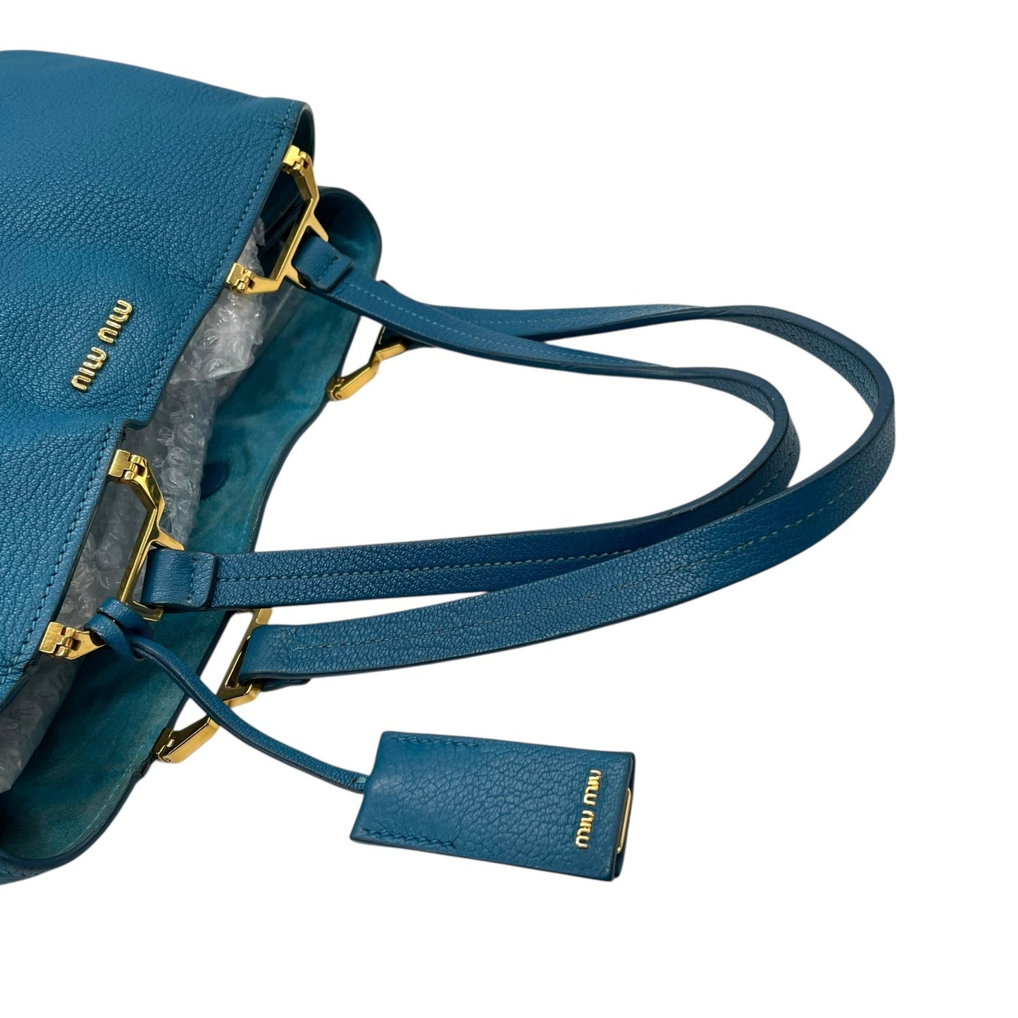 miumiu ミュウミュウ トートバッグ 青 ブルー 本革 レザー シボ革 大容量 肩掛け可能 A4収納 ゴールド金具 ポーチ付き レディース C4