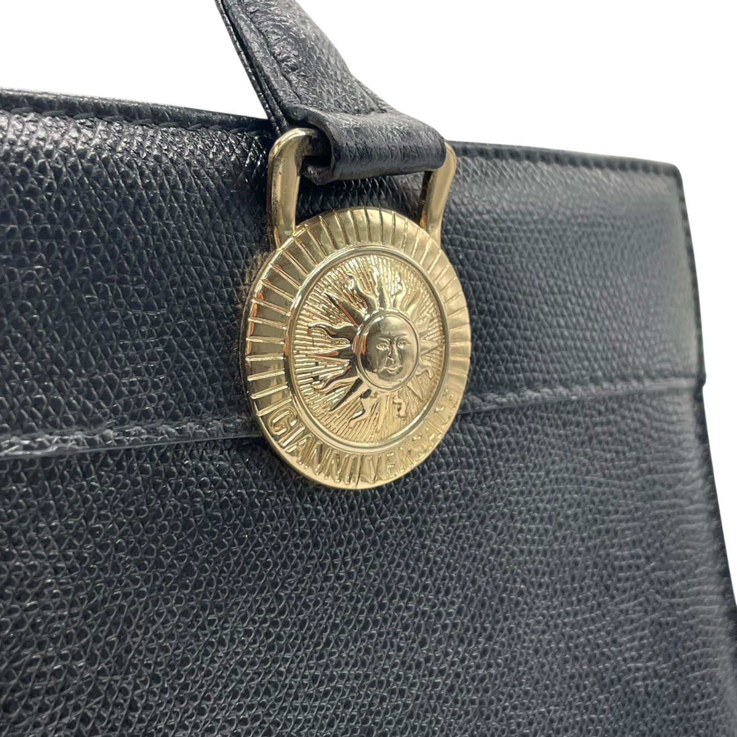 Authentic GIANNI VERSACE Black Sunburst Embossed Leather Handbag Gold Hardware Vintage Archive Women