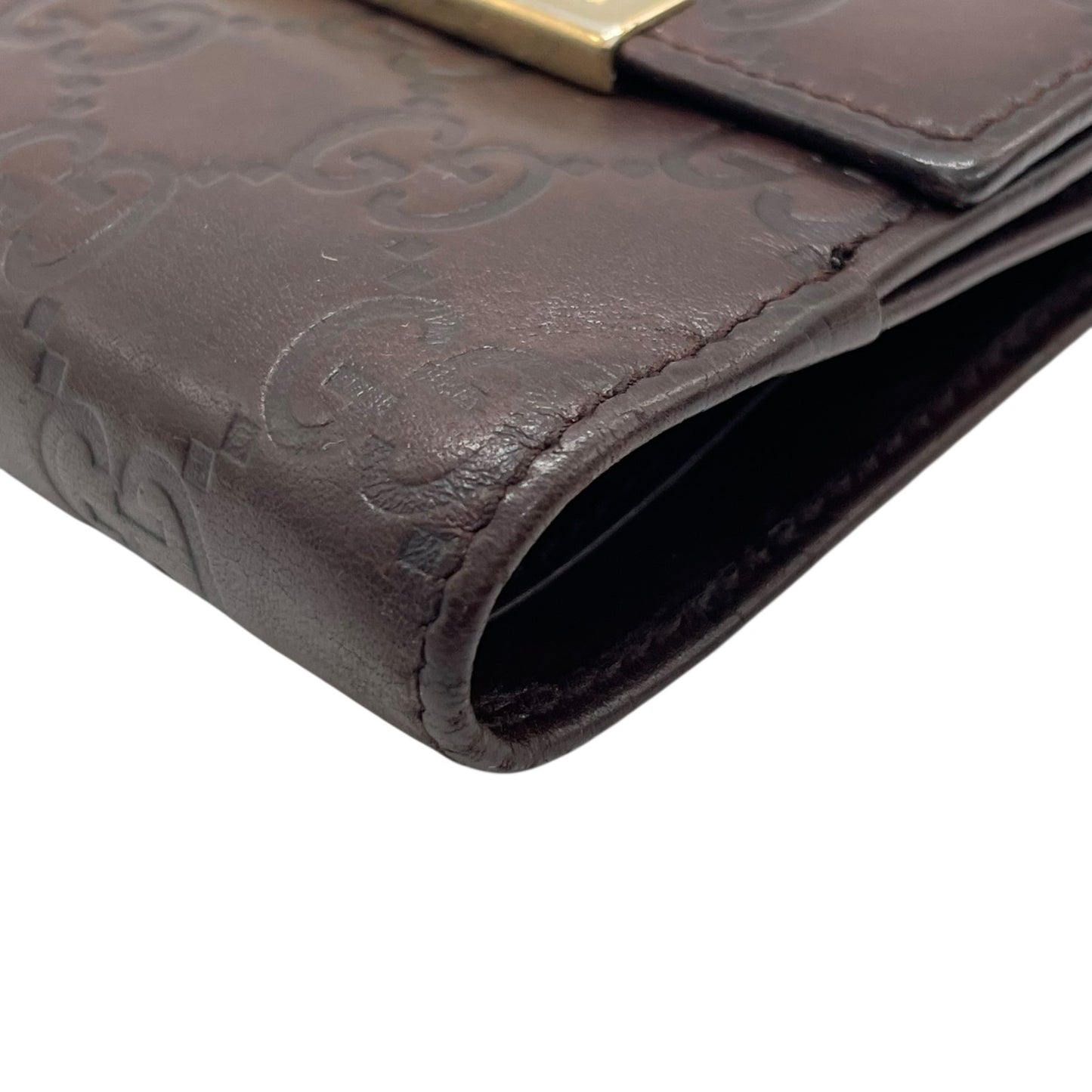 GUCCI グッチ グッチシマ 二つ折り財布 コンパクトウォレット GG柄 型押し レザー ブラウン ゴールド金具 プレートロゴ ヴィンテージ レディース M2