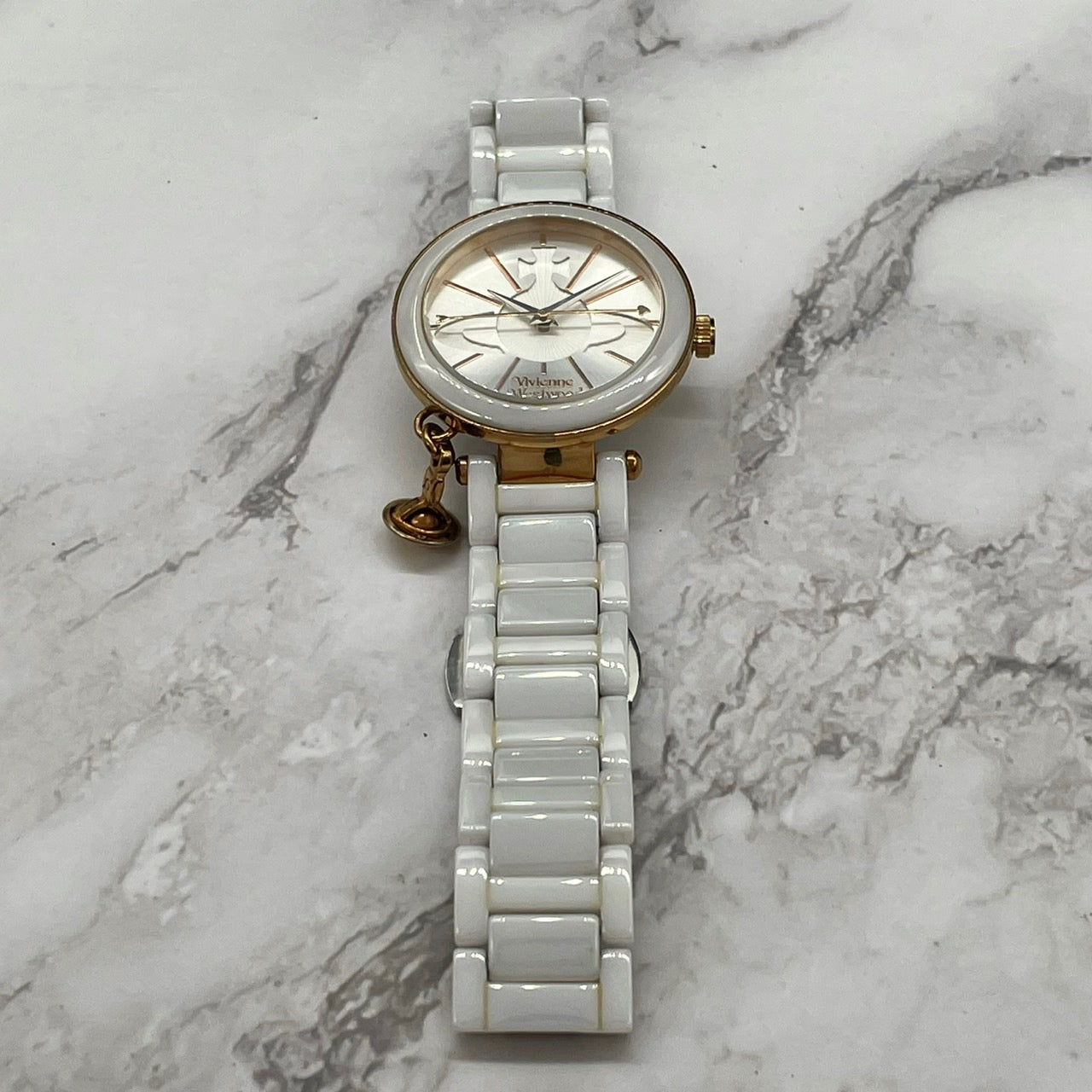 【電池交換済/稼働品】ヴィヴィアンウエストウッド セラミック 腕時計 レディース 白 ローズゴールド オーブ チャーム アナログ クオーツ オーブ チャーム Vivienne Westwood VV069RSWH クリーニング済 G3