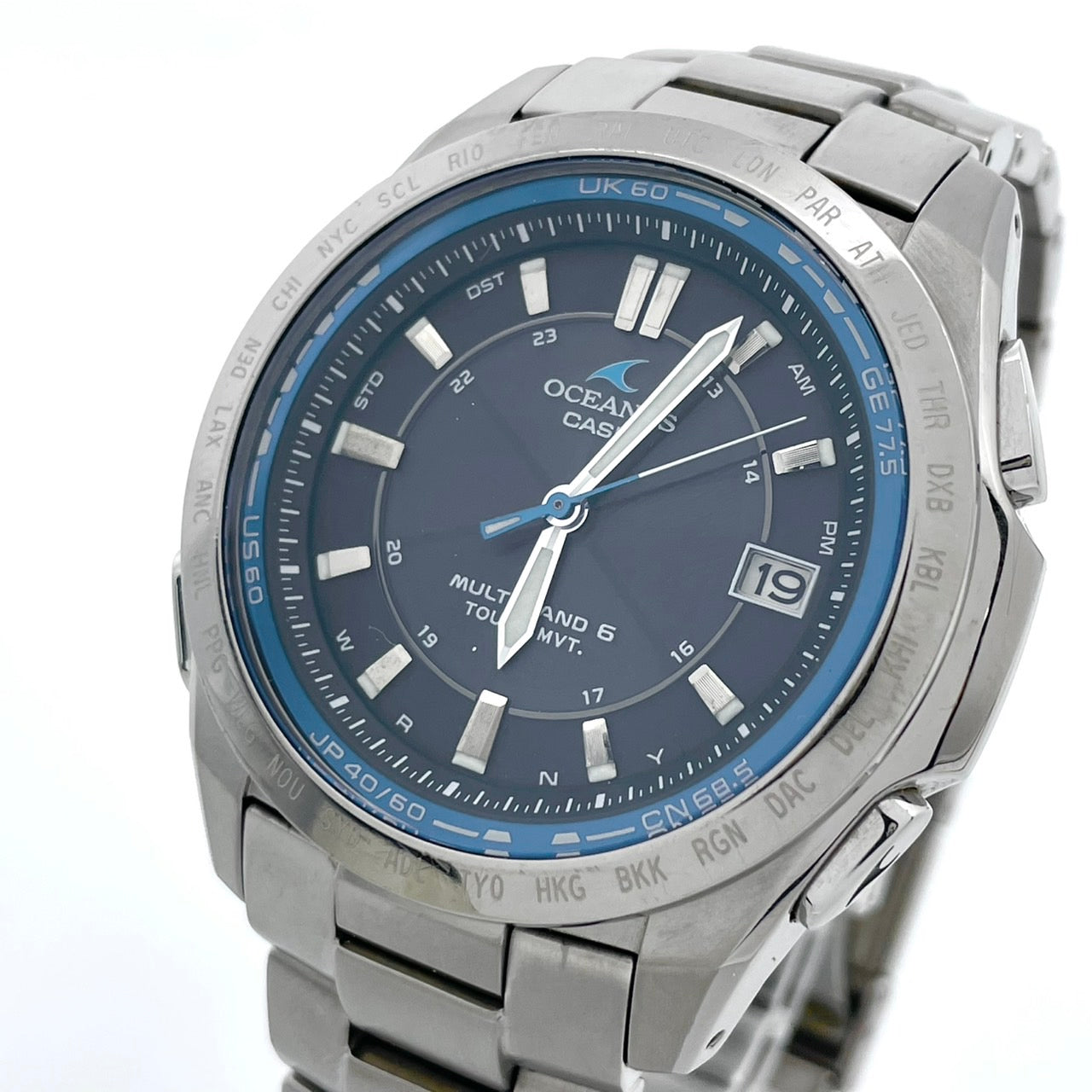 【稼働品／美品】カシオ オシアナス 腕時計 OCW-T100 メンズ 電波ソーラー チタンモデル タフソーラー MULTI BAND 6 アナログ デイト カレンダー シルバー ネイビー文字盤 ブルーベゼル ビジネス 高機能 箱付き クリーニング済み G