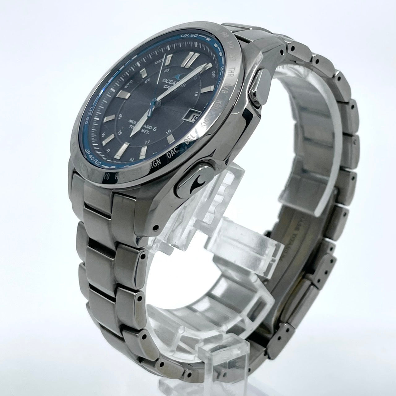 【稼働品／美品】カシオ オシアナス 腕時計 OCW-T100 メンズ 電波ソーラー チタンモデル タフソーラー MULTI BAND 6 アナログ デイト カレンダー シルバー ネイビー文字盤 ブルーベゼル ビジネス 高機能 箱付き クリーニング済み G