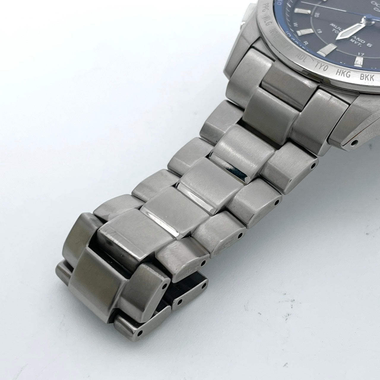 【稼働品／美品】カシオ オシアナス 腕時計 OCW-T100 メンズ 電波ソーラー チタンモデル タフソーラー MULTI BAND 6 アナログ デイト カレンダー シルバー ネイビー文字盤 ブルーベゼル ビジネス 高機能 箱付き クリーニング済み G