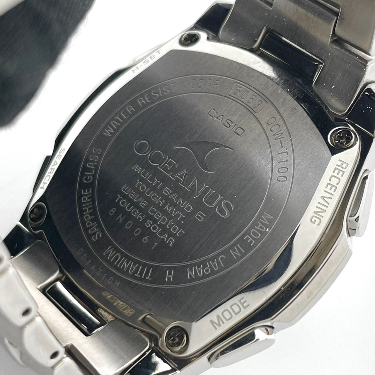 【稼働品／美品】カシオ オシアナス 腕時計 OCW-T100 メンズ 電波ソーラー チタンモデル タフソーラー MULTI BAND 6 アナログ デイト カレンダー シルバー ネイビー文字盤 ブルーベゼル ビジネス 高機能 箱付き クリーニング済み G