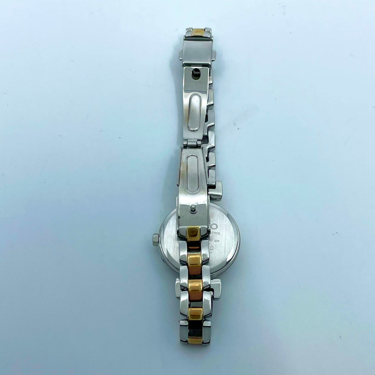 【稼働品／美品】セイコー 腕時計 1B21-0AK0 レディース 電波ソーラー ピンク文字盤 リボン柄 シルバー ゴールド コンビカラー アナログ ラウンド フェミニン エレガント かわいい ビジネス オフィス クリーニング済み G5