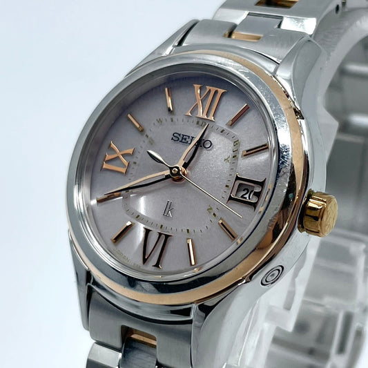 【稼働品／美品】セイコー ルキア 人気モデル 腕時計 1B22-0AS0 電波ソーラー レディース デイト ピンクゴールド コンビカラー ローマ数字 上品 エレガント ビジネス オフィス 高機能 洗練デザイン 手元華やか クリーニング済 G5