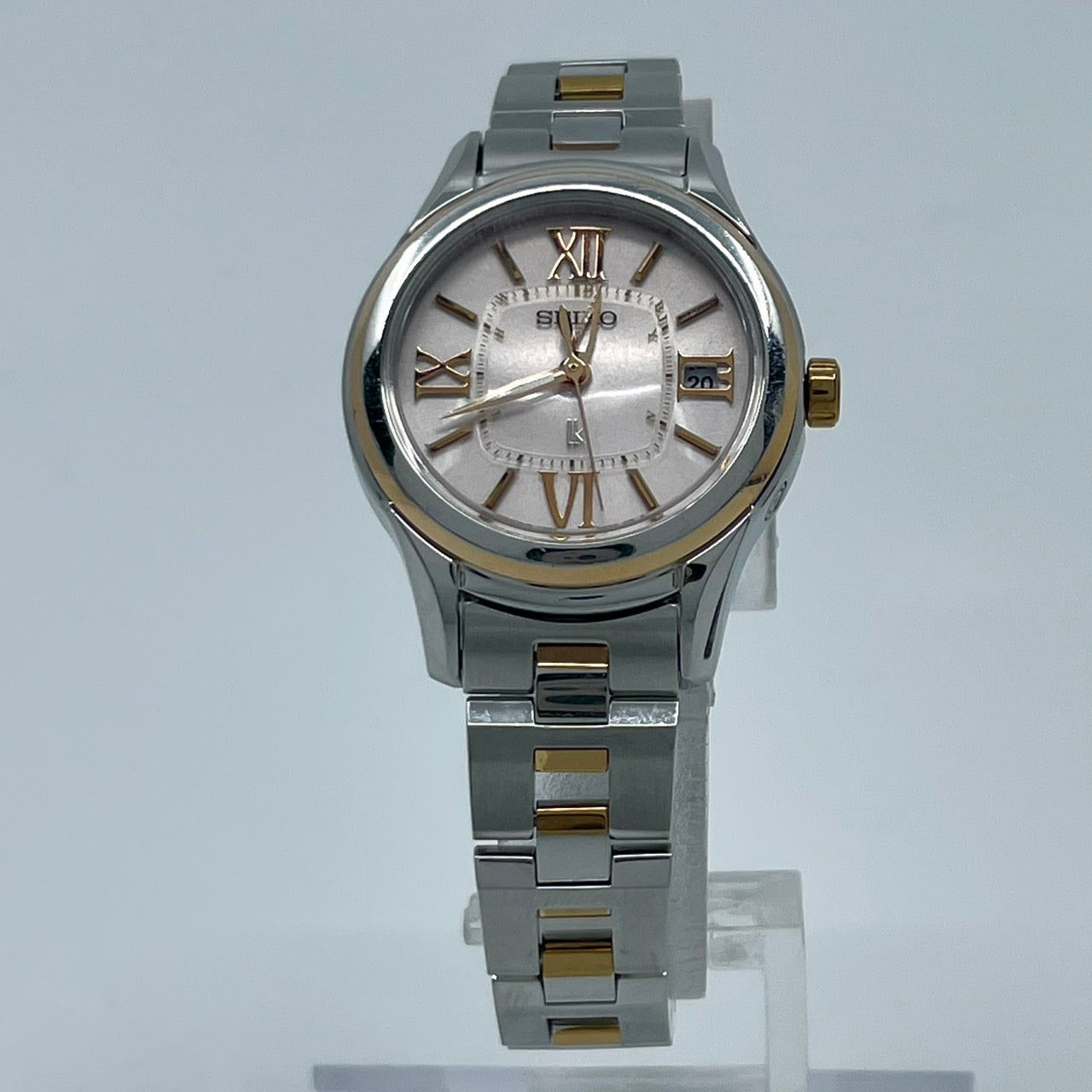 【稼働品／美品】セイコー ルキア 人気モデル 腕時計 1B22-0AS0 電波ソーラー レディース デイト ピンクゴールド コンビカラー ローマ数字 上品 エレガント ビジネス オフィス 高機能 洗練デザイン 手元華やか クリーニング済 G5