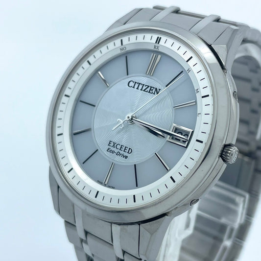 【稼働品／極美品】シチズン エクシード 腕時計 H113-T016189 電波ソーラー チタン ユニセックス デイト シルバー 白文字盤 薄型軽量 エレガント 高級 ドレスウォッチ ビジネス オフィス 高機能 人気モデル クリーニング済み G2