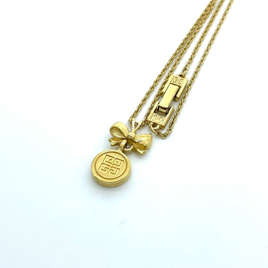 美品 GIVENCHY ジバンシー ネックレス ペンダント リボンモチーフ G4ロゴ ゴールドカラー ヴィンテージ アクセサリー ジュエリー レディース I1