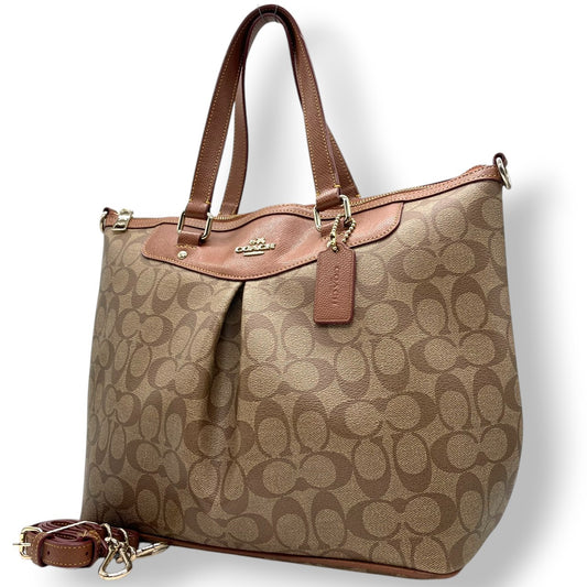 【未使用級】コーチ COACH シグネチャー 2WAY トートバッグ ショルダーバッグ 斜め掛け PVC レザー ブラウン 茶色 ゴールド金具 34614 A4収納可 大容量 ギャザー プリーツ 軽量 通勤 通学 ビジネス レディース 鞄 カバン E5