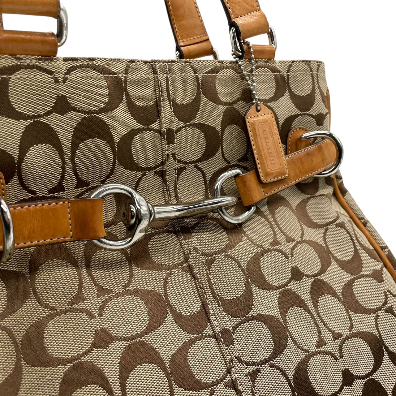 コーチ COACH トートバッグ ハンドバッグ シグネチャー キャンバス レザー 本革 ブラウン 茶色 ベージュ シルバー金具 A4収納可 肩掛け可 ワンショルダー 自立可 ヴィンテージ ビンテージ クラシック エレガント 希少 鞄 カバン 通勤 通学 s71