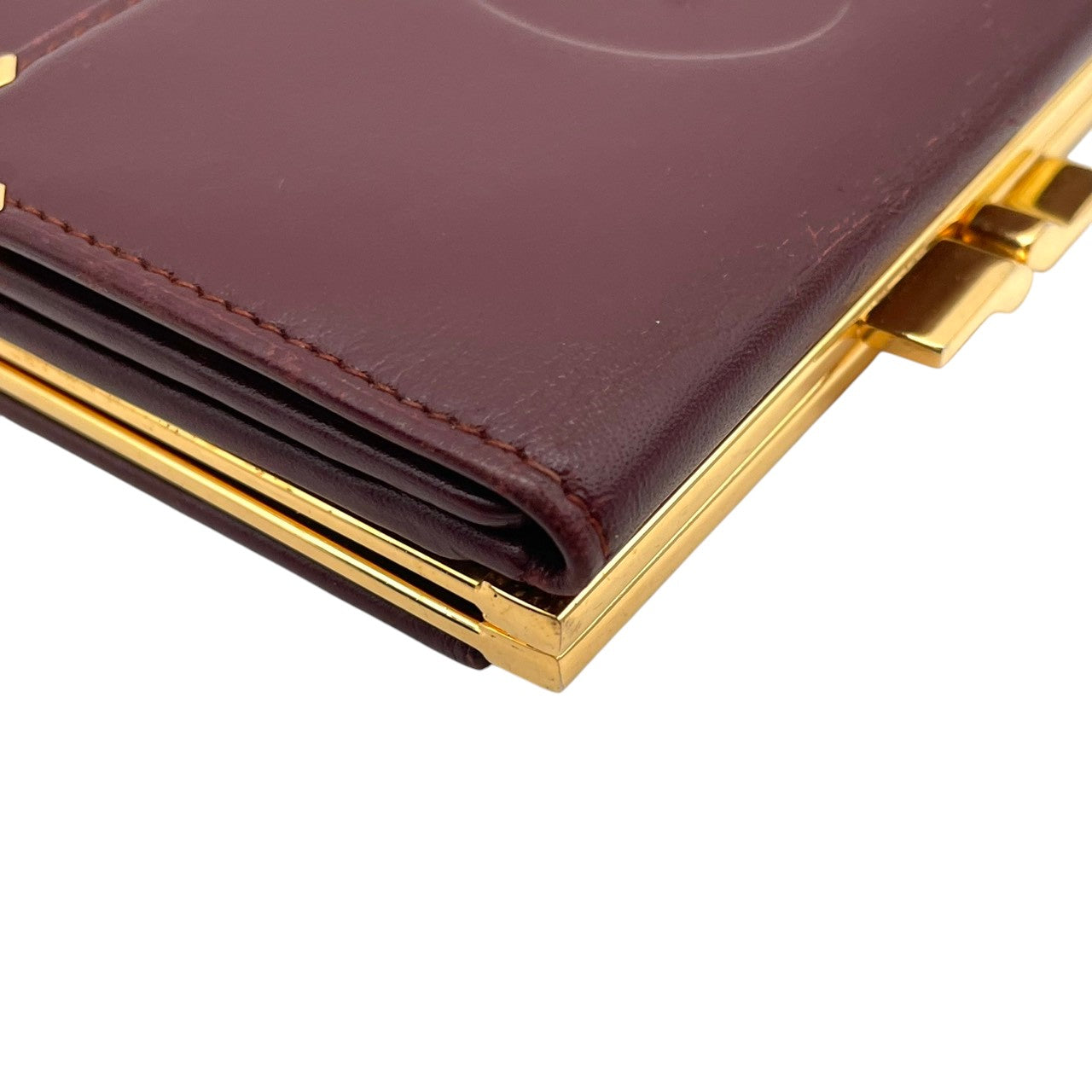 Cartier カルティエ コインケース 小銭入れ 財布 ウォレット コンパクト マストライン レザー 本革 ボルドー ワインレッド 赤茶色 ゴールド金具 ヴィンテージ ビンテージ エレガント クラシック 上品 デイリー 男女兼用 小物 M4