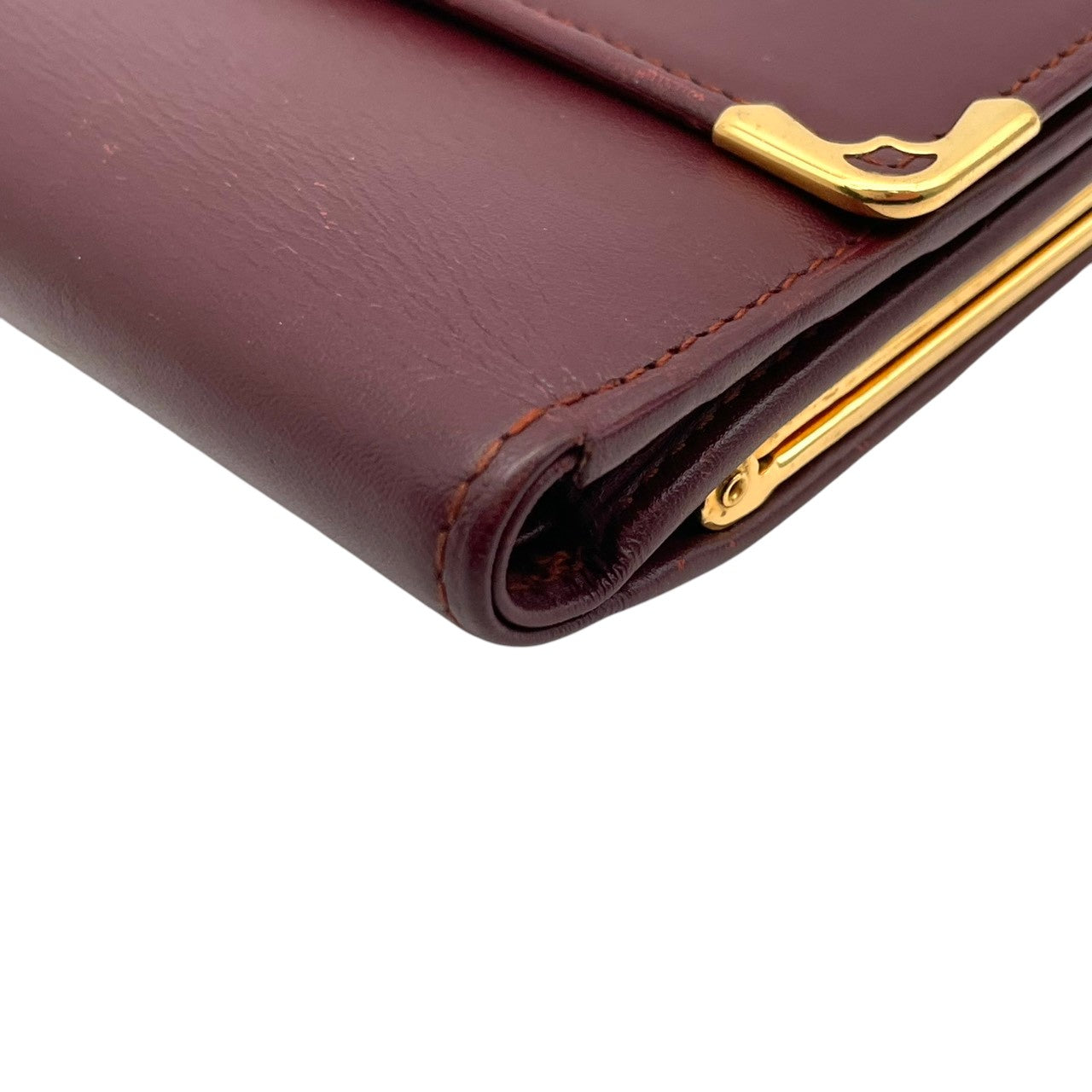 Cartier カルティエ コインケース 小銭入れ 財布 ウォレット コンパクト マストライン レザー 本革 ボルドー ワインレッド 赤茶色 ゴールド金具 ヴィンテージ ビンテージ エレガント クラシック 上品 デイリー 男女兼用 小物 M4