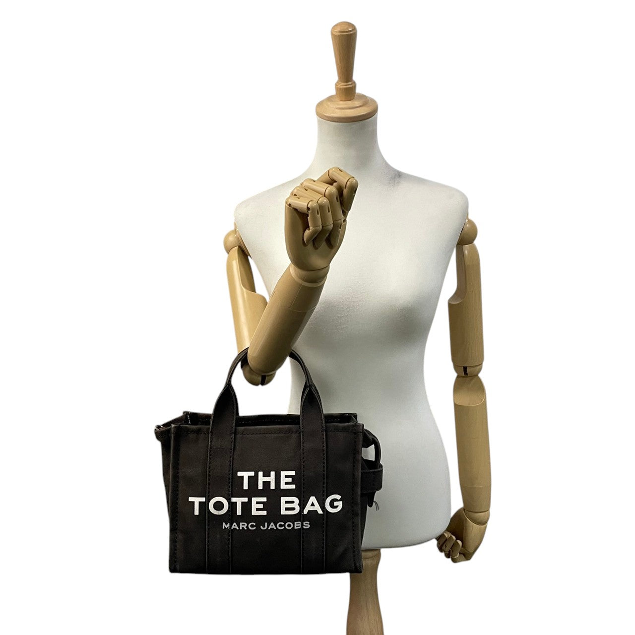 マークジェイコブス MARC JACOBS ザ トートバッグ THE TOTE BAG キャンバス ブラウン ブラック 茶 黒 2WAY ショルダー バッグ ハンドバッグ 斜め掛け可 クロスボディ 自立可 レディース カジュアル ロゴ デザイン S75