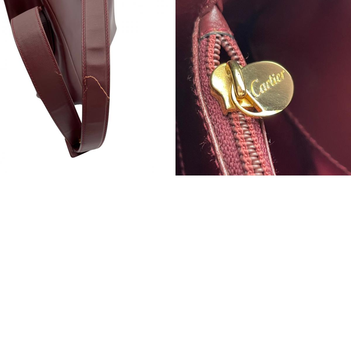 良品 カルティエ Cartier ショルダーバッグ レザー 本革 レッド 赤 ボルドー ゴールド金具 エレガント クラシック カジュアル お出かけ デート 普段使い 通勤 通学 トラベル ヴィンテージ ビンテージ レディース 斜め掛け可 肩掛け 鞄 S92