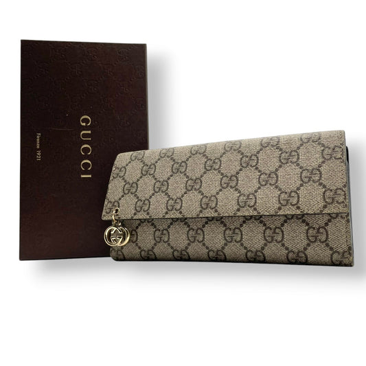 美品 グッチ GUCCI 長財布 ロングウォレット フラップ PVC レザー GGスプリーム シェリーライン リボン ブラウン 茶 レディース カジュアル フォーマル クラシック エレガント ビンテージ レトロ デイリー 通勤 通学 サイフ 小物 上品 M3