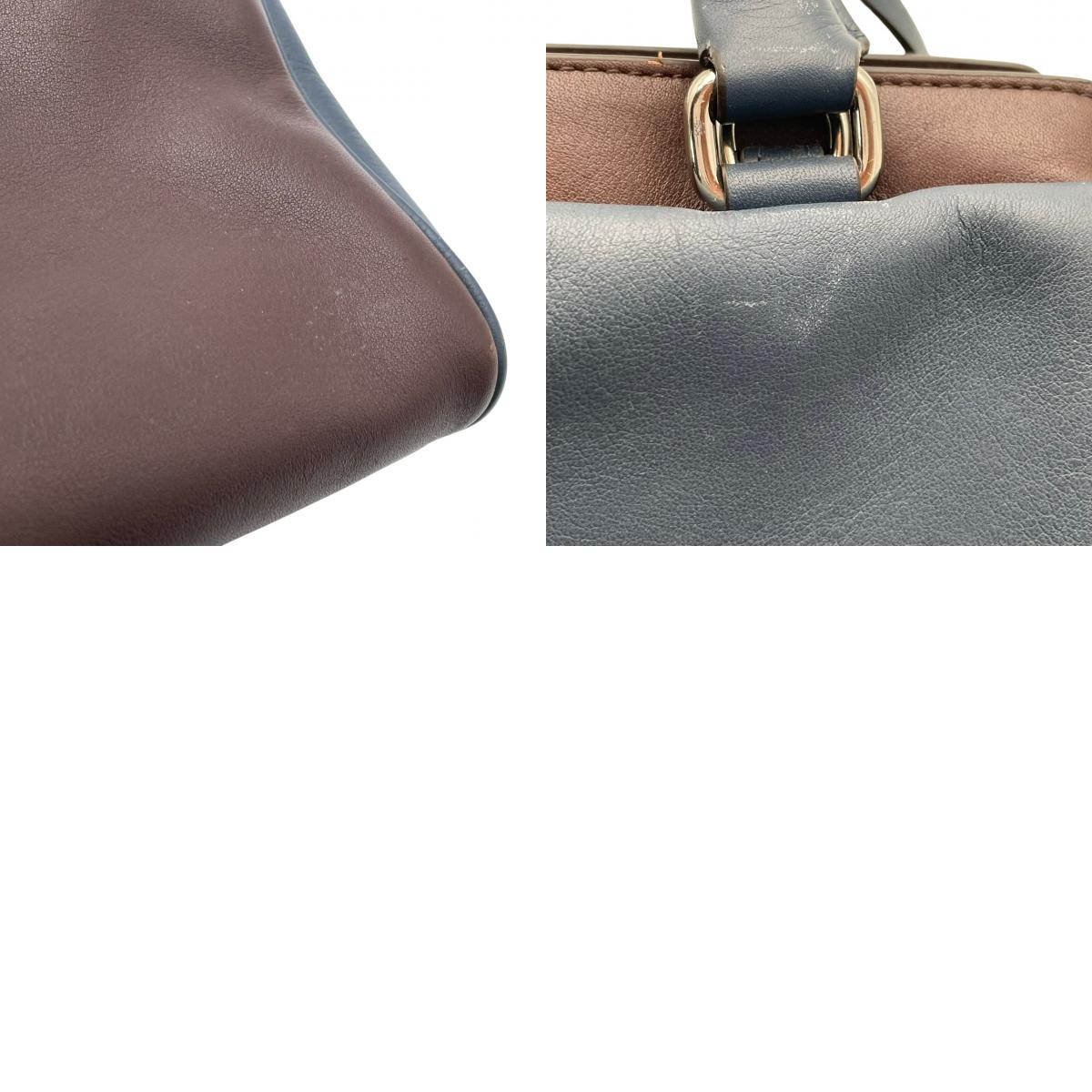 コーチ COACH レガシー ノースサウス サッチェル ハンドバッグ レザー 本革 ブラウン ネイビー バイカラー 26301 F1320 タッセル シルバー金具 フラップ 手持ち トップハンドル レディース 上品 クラシック 日常使い 収納力 S2