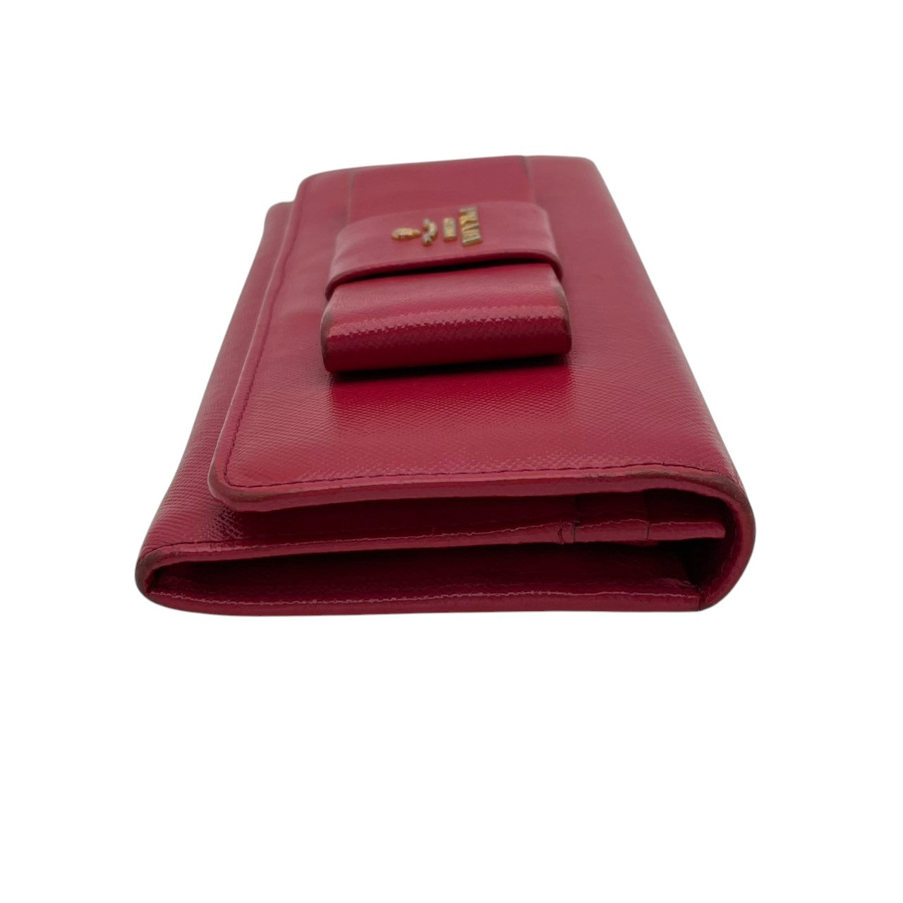 プラダ PRADA サフィアーノ フィオッコ 長財布 レザー 本革 ピンク リボン 1M1132 フラップ 二つ折り ロングウォレット ゴールド金具 ロゴ金具 札入れ 小銭入れ カード収納 レディース 上品 クラシック 日常使い 収納力 M3