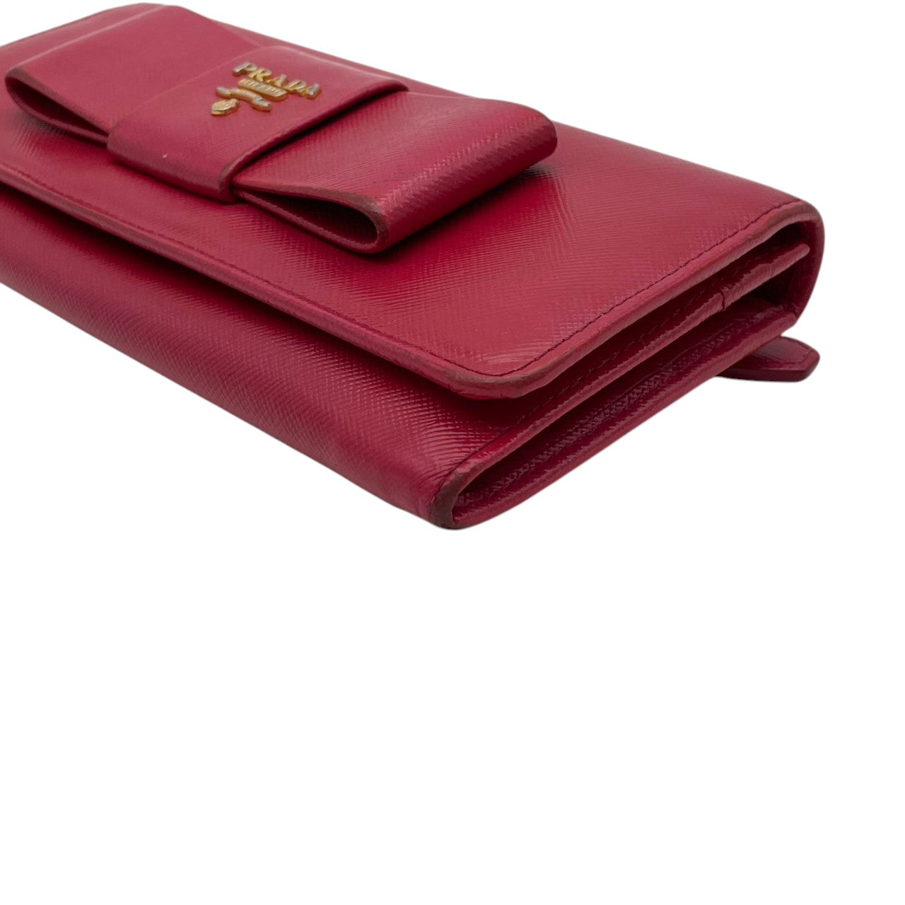 プラダ PRADA サフィアーノ フィオッコ 長財布 レザー 本革 ピンク リボン 1M1132 フラップ 二つ折り ロングウォレット ゴールド金具 ロゴ金具 札入れ 小銭入れ カード収納 レディース 上品 クラシック 日常使い 収納力 M3