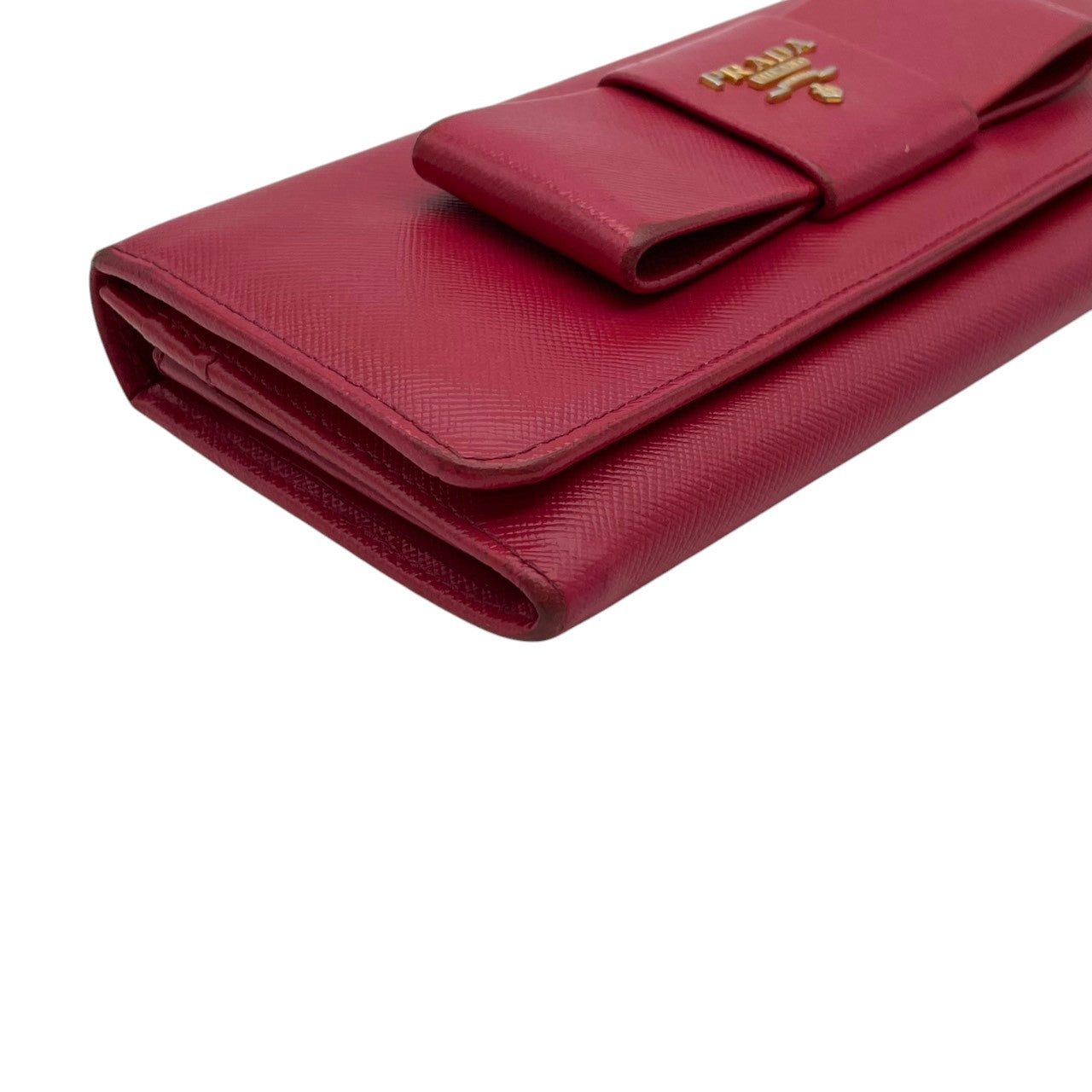 プラダ PRADA サフィアーノ フィオッコ 長財布 レザー 本革 ピンク リボン 1M1132 フラップ 二つ折り ロングウォレット ゴールド金具 ロゴ金具 札入れ 小銭入れ カード収納 レディース 上品 クラシック 日常使い 収納力 M3