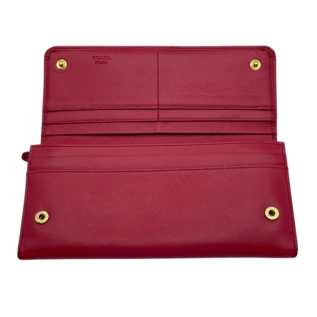 プラダ PRADA サフィアーノ フィオッコ 長財布 レザー 本革 ピンク リボン 1M1132 フラップ 二つ折り ロングウォレット ゴールド金具 ロゴ金具 札入れ 小銭入れ カード収納 レディース 上品 クラシック 日常使い 収納力 M3