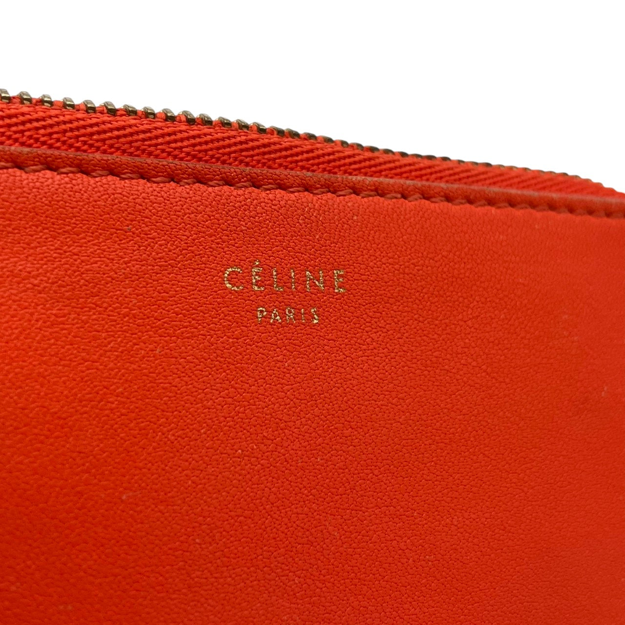 セリーヌ CELINE コインケース レザー 本革 オレンジ ワインレッド バイカラー ジップ 小銭入れ カードケース ゴールド金具 ロゴ刻印 コンパクト ミニウォレット ファスナー開閉 マルチケース レディース 上品 シンプル 日常使い 収納力 M3