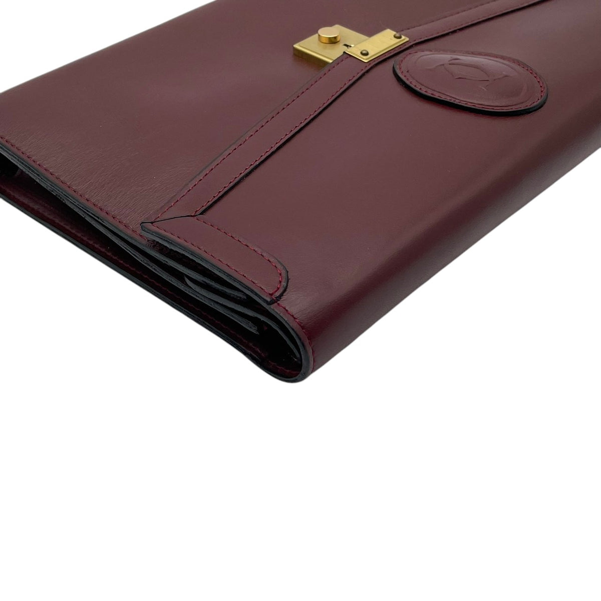 カルティエ Cartier マストライン Must de Cartier レザー セカンドバッグ クラッチバッグ 手提げかばん フラップ 鍵付き ロック金具 2Cモチーフ エンボス 本革 ボルドー バーガンディ 赤紫 ゴールド金具 ビンテージ S51