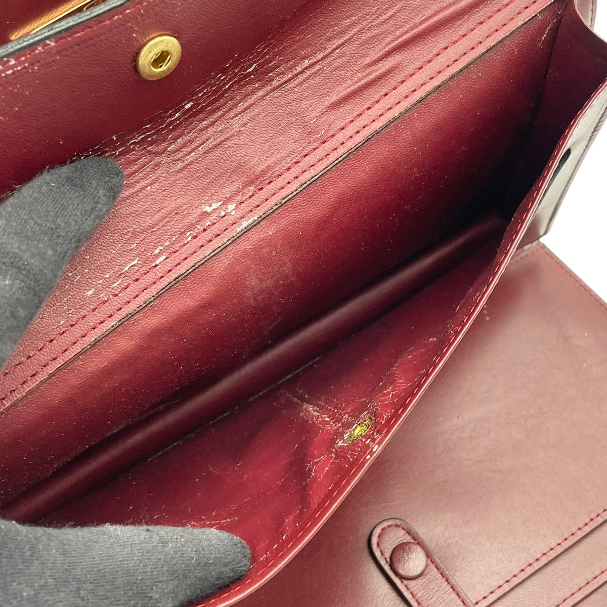 カルティエ Cartier マストライン Must de Cartier レザー セカンドバッグ クラッチバッグ 手提げかばん フラップ 鍵付き ロック金具 2Cモチーフ エンボス 本革 ボルドー バーガンディ 赤紫 ゴールド金具 ビンテージ S51