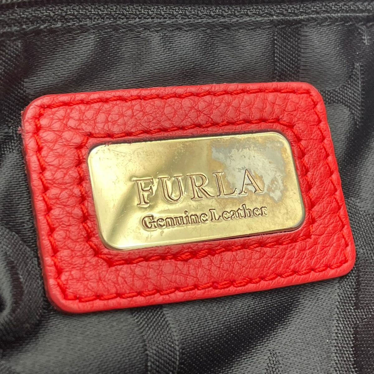 【良品】FURLA フルラ トートバッグ ハンドバッグ シボ革 レザー オレンジ 赤系 マルチハンドル 肩掛け 手提げ A4収納可能 大容量 チャーム付き レディース カジュアル エレガント カバン 鞄 オシャレ ブランド S83