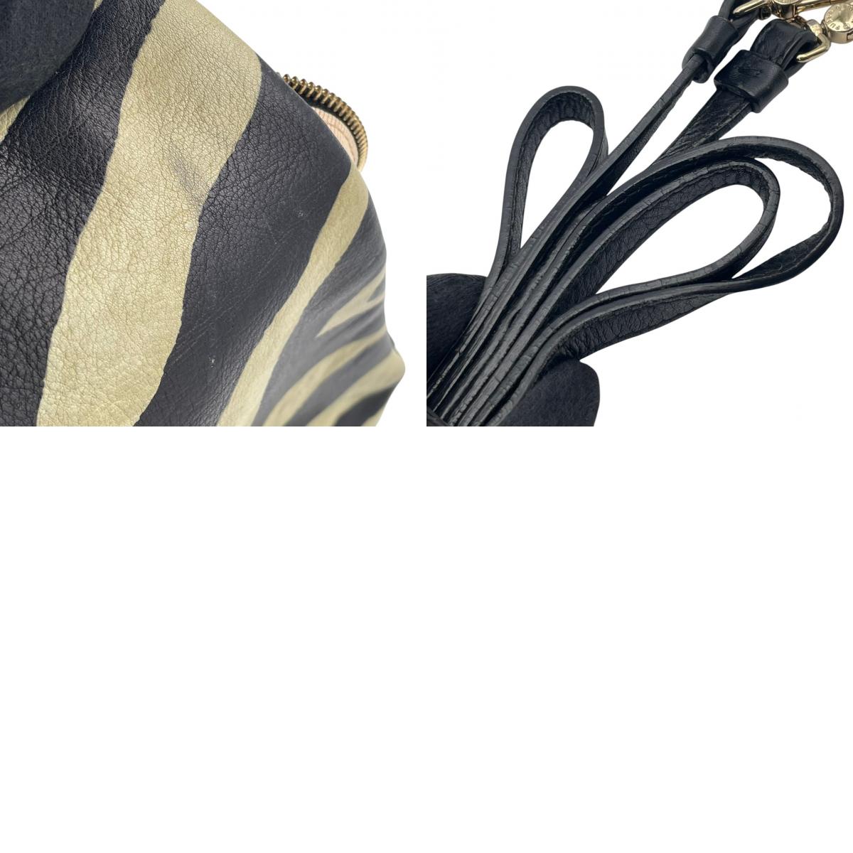 【良品】FURLA フルラ ショルダーバッグ ハンドバッグ 2WAY ゼブラ柄 アニマル柄 シボ革 レザー ブラック 黒 ホワイト 白 斜め掛け 肩掛け 手提げ エレガント モード カジュアル レディース カバン 鞄 S83
