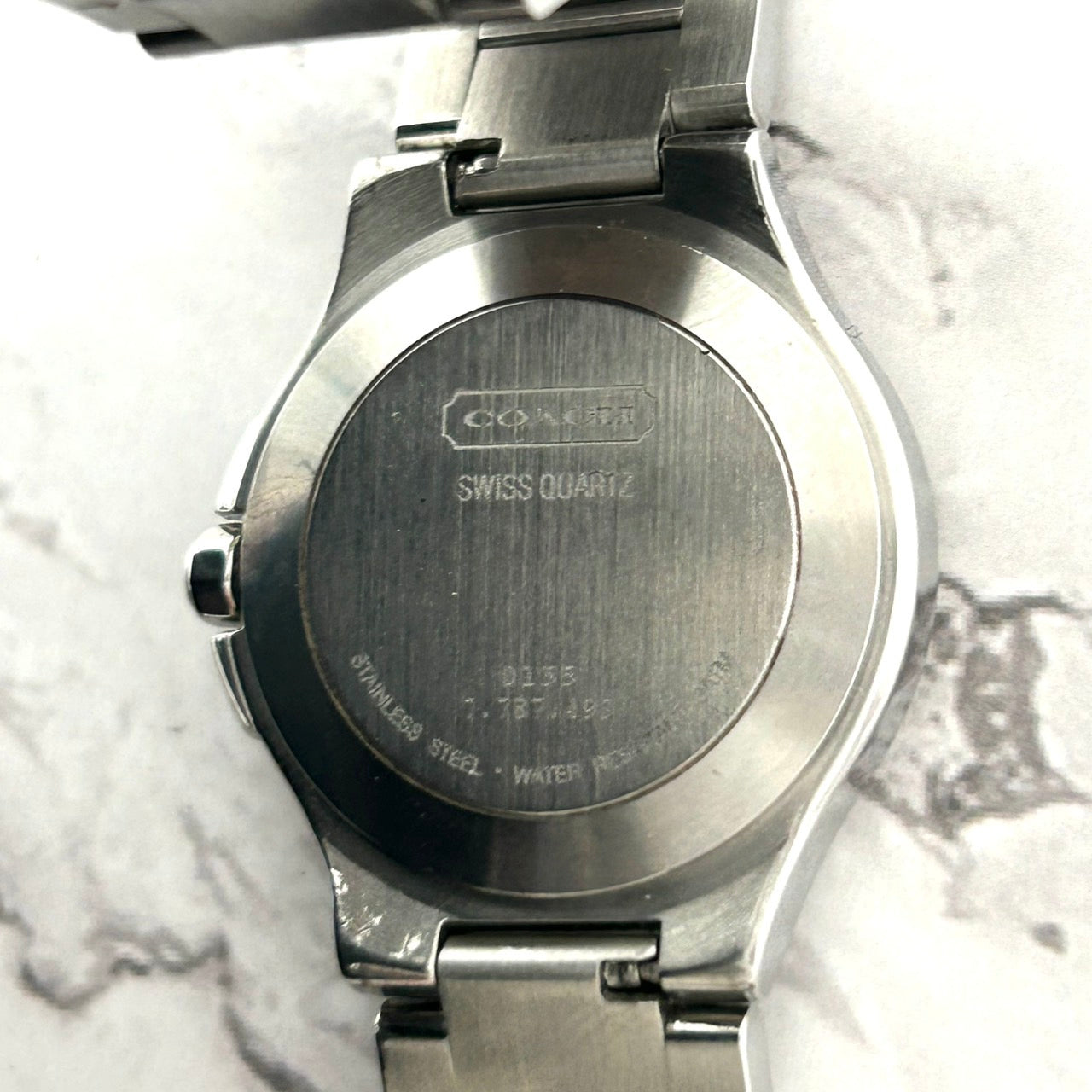 【稼働品】COACH コーチ 0155 レディース 腕時計 ブラック文字盤 アナログ クオーツ ラウンド クラシック エレガント ドレスウォッチ シンプル ビジネス カジュアル シルバー ステンレススチール SWISS QUARTZ クリーニング済み i10