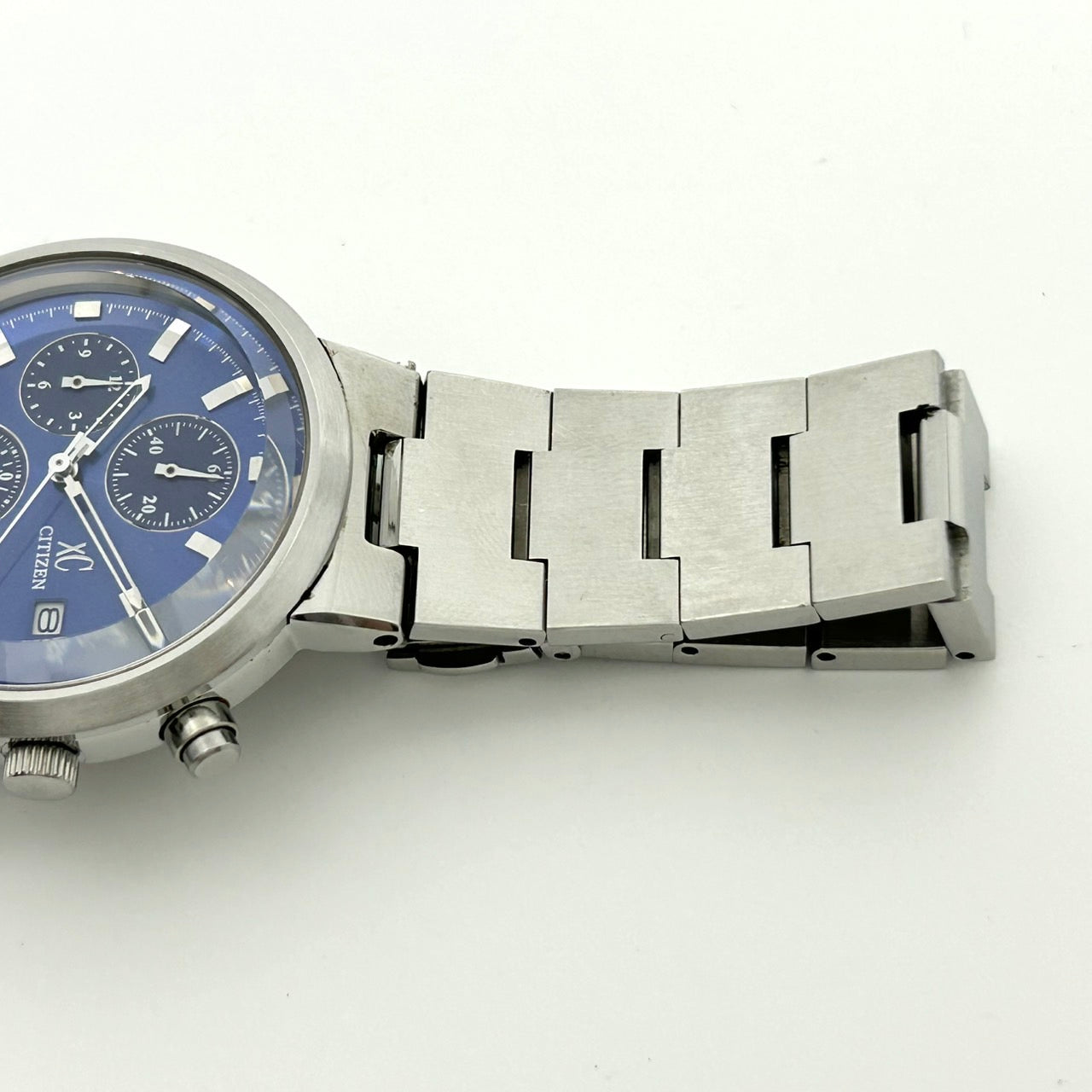 【電池交換済／稼働品】 CITIZEN シチズン xC クロスシー メンズ 腕時計 0560-H16889 クオーツ クロノグラフ デイト 青文字盤 シルバー ステンレススチール アナログ エレガント クラシック ビジネス フォーマル クリーニング済 G4