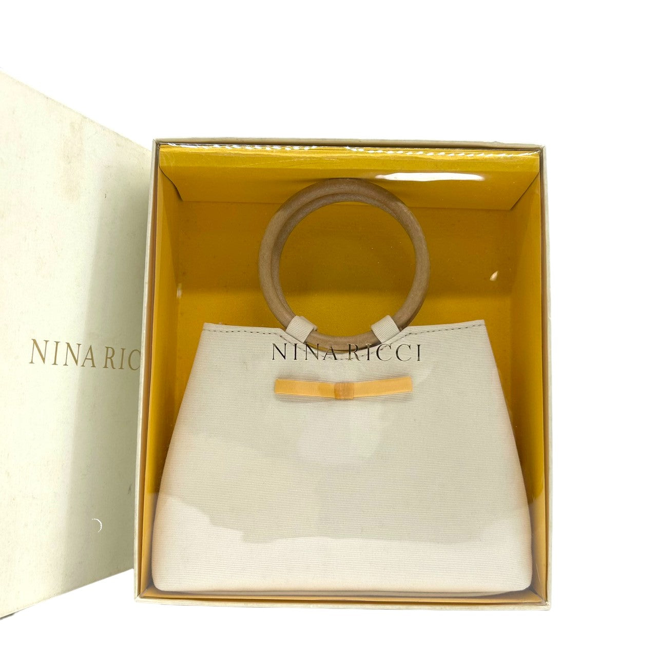 【美品/箱付き】ニナリッチ NINA RICCI ハンドバッグ ミニバッグ キャンバス ウッドハンドル リングハンドル ホワイト 白 リボンモチーフ レディース エレガント フェミニン パーティ コンパクト 自立可 クリーニング済み H