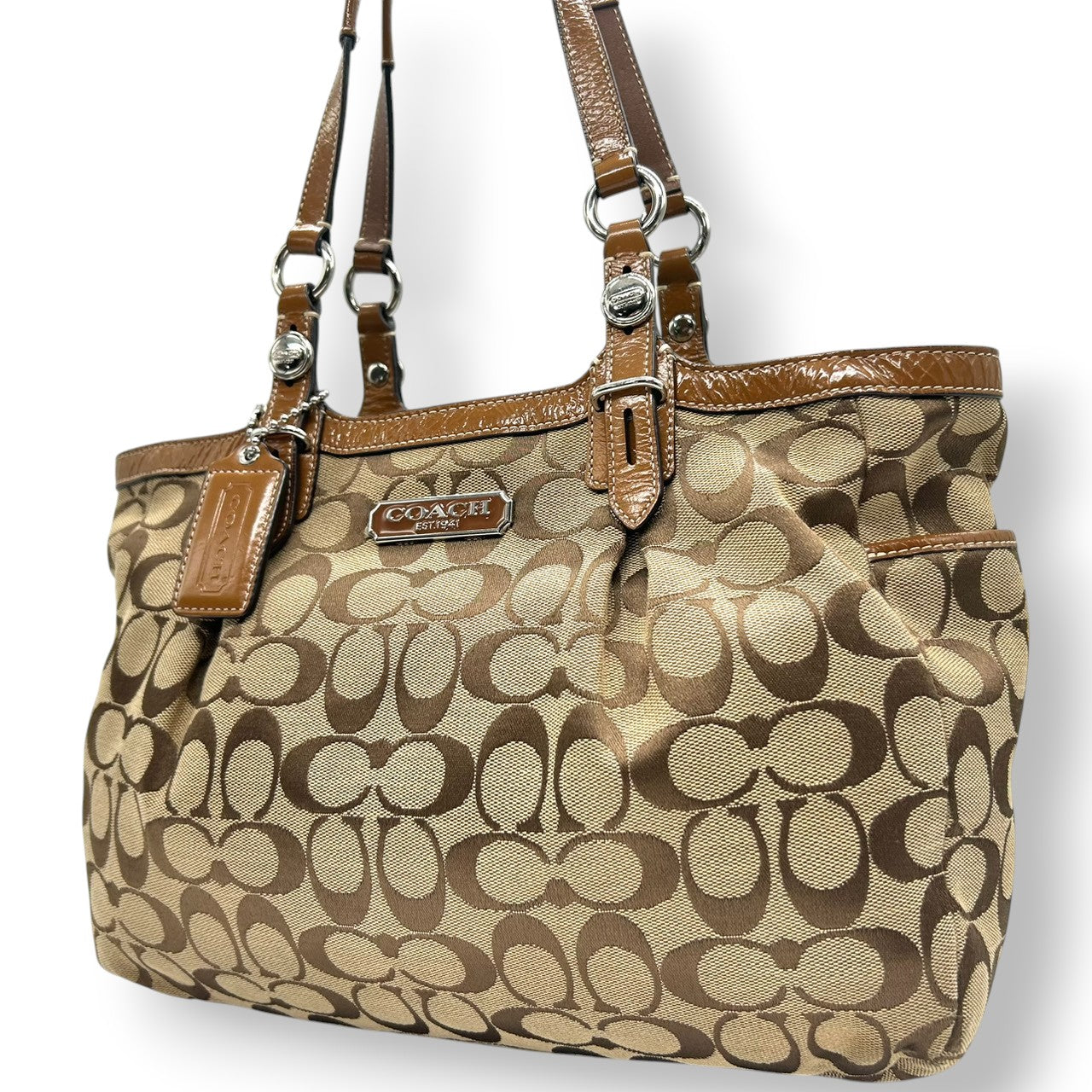 コーチ トートバッグ シグネチャー キャンバス レザー ブラウン F15146 A4収納可 肩掛け ワンショルダー 通勤 通学 レディース ハンドバッグ チャーム付き エレガント クラシックデザイン クリーニング済み s63