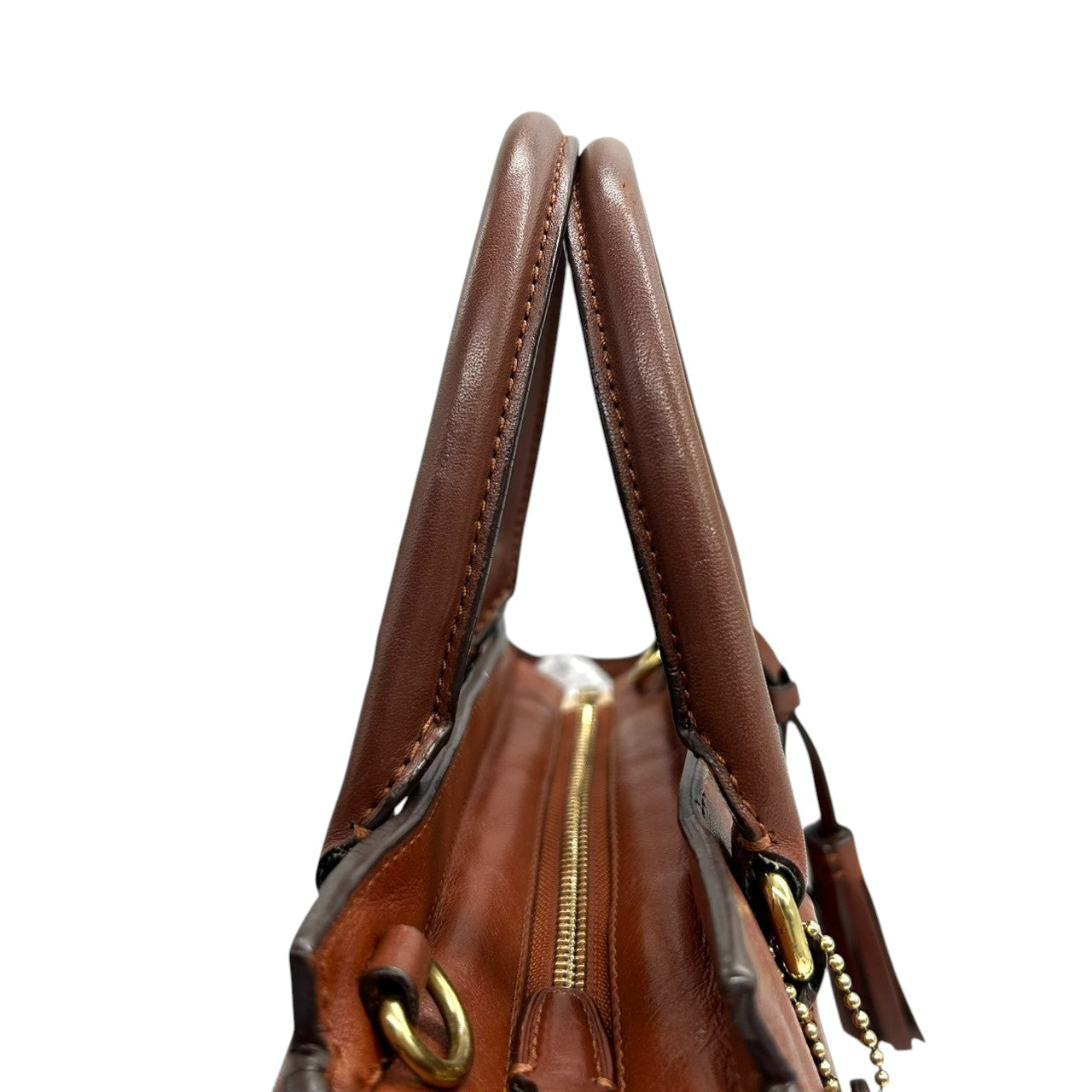 コーチ 2WAY トートバッグ ハンドバッグ ショルダーバッグ レザー 本革 ブラウン 斜め掛け可 タッセルチャーム付き レディース ミニトート コンパクト 通勤 カジュアル エレガント ロゴプレート 上質レザー 自立可 クリーニング済み s53