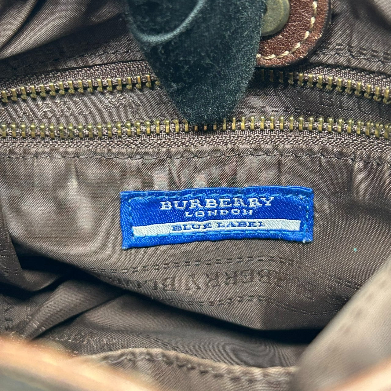 バーバリーブルーレーベル 巾着型 ショルダーバッグ ノバチェック ウール レザー ブラウン レディース BURBERRY BLUE LABEL 斜め掛け ポシェット ミニバッグ ドローストリング クラシックデザイン 人気モデル E10