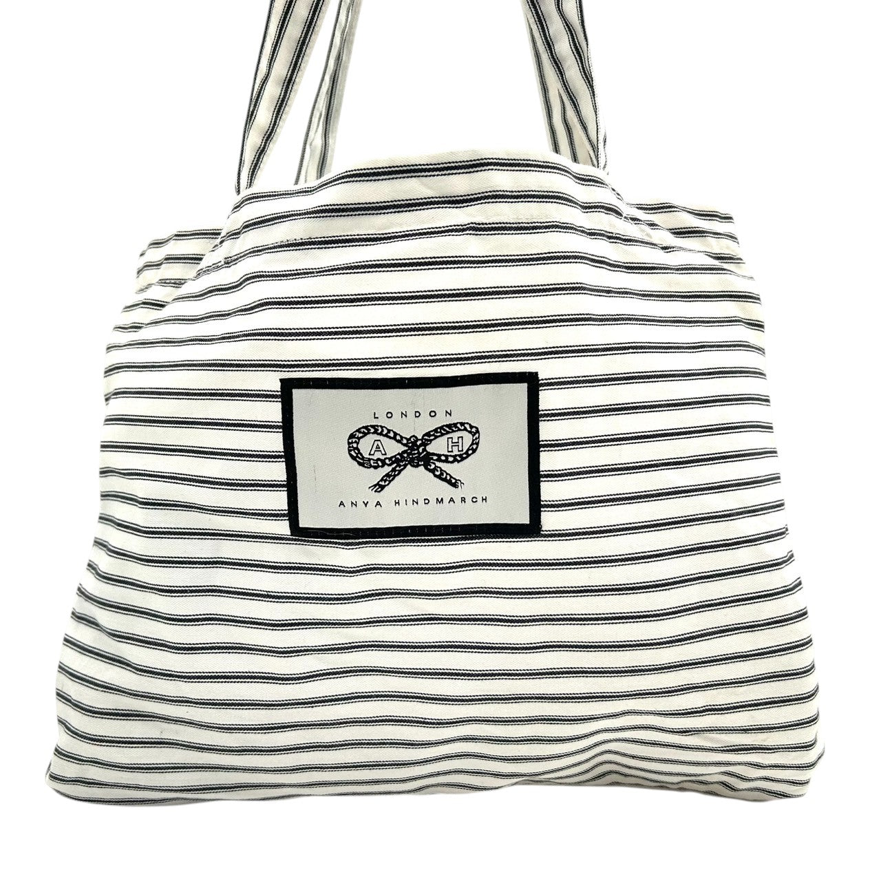 【美品】アニヤハインドマーチ ANYA HINDMARCH トートバッグ エコバッグ ショッピングバッグ 肩掛け A4収納可 キャンバス コットン ストライプ ボーダー アイボリー ブラック リボン ロゴ 刺繍 ロンドン レディース 軽量 薄型 スリム E8