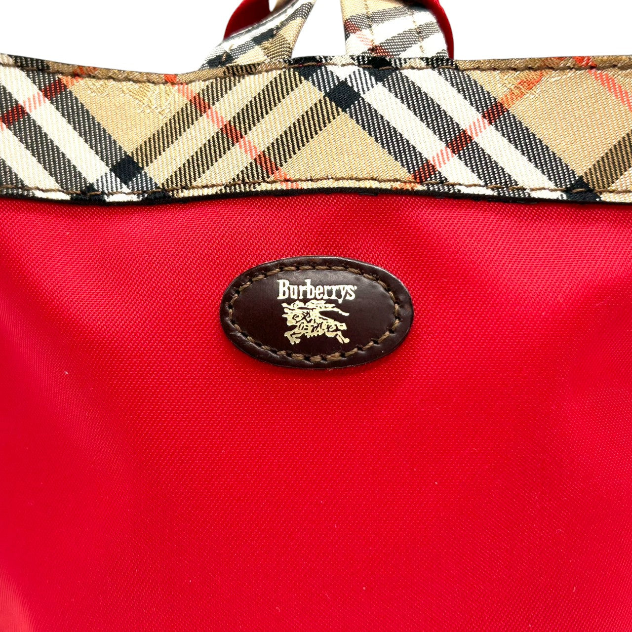 【未使用級】バーバリー BURBERRY ハンドバッグ ミニバッグ ポーチ ナイロン レザー ノバチェック レッド 赤 軽量 コンパクト コスメポーチ アクセサリーポーチ 小物入れ レディース 鞄 カバン パーティー s10