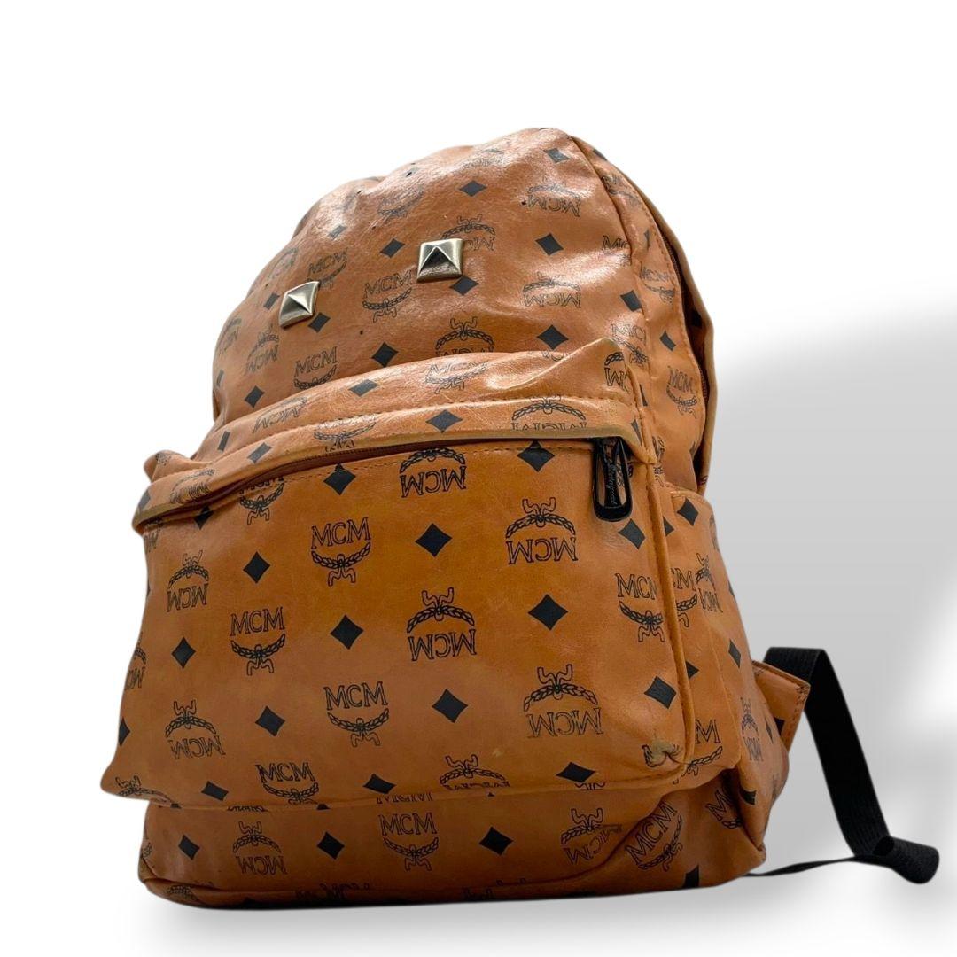 エムシーエム MCM バックパック ヴィセトス柄 茶 ブラウン A4収納 スタッズ レザー 本革 リュックサック T2