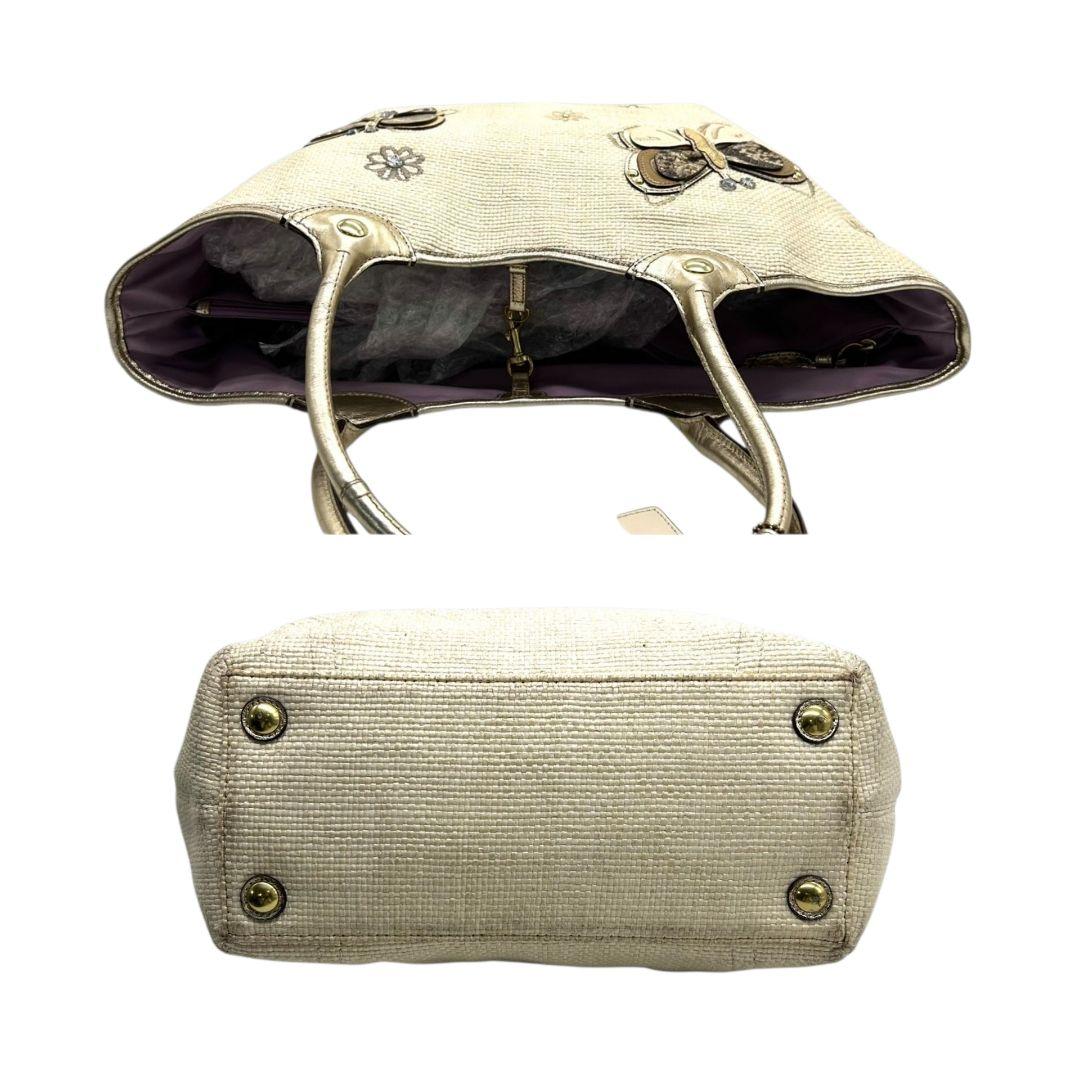 コーチ トートバッグ 白 ホワイト かごバッグ バタフライ 蝶 ストロー レザー A4収納 肩掛け可 ワンショルダー ゴールド金具 ロゴタグ チャーム スタッズ F16586 COACH