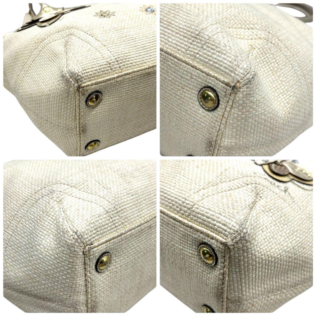 コーチ トートバッグ 白 ホワイト かごバッグ バタフライ 蝶 ストロー レザー A4収納 肩掛け可 ワンショルダー ゴールド金具 ロゴタグ チャーム スタッズ F16586 COACH